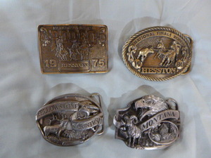 lot 141 image: 4 Belt Buckles