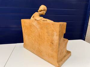 Plaster Statue of Woman on Bench