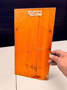 Rat Fink style hand drawn picture on wood plank