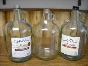 lot 16 image: 3 glass gallon jugs