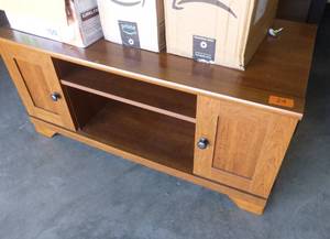 lot 24 image: TV stand - measures 42x22x19