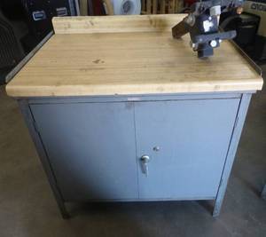 lot 37 image: Metal storage cabinet with formica on top 36x25x35