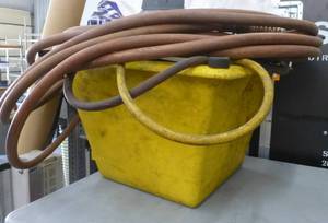 lot 59 image: Plastic step (24 in at bottom 14 in at top) and hoses