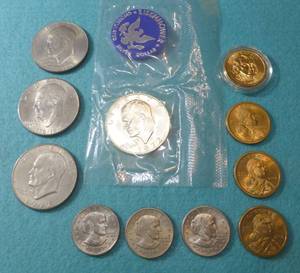 lot 87 image: 11 Dollar coins  Eisenhower, Anthony, Sacagawea, Madison