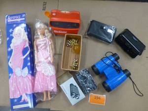 lot 194 image: Group of toy binoculars, viewmaster, Jenna doll