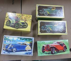 lot 200 image: FOUR New in box Avon cars with after shave