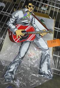 lot 240 image: Swinging leg Elvis clock - new