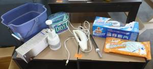 lot 320 image: Household items - electric carving knife, magic reach shower cleaner, food chopper, Dryel for home dry cleaning and a water bucket