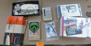 lot 325 image: Misc lot of hair clipper, GPS, radio, baseball game