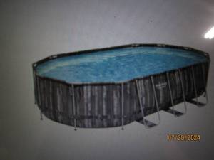 lot 47 image: Bestway Power Steel 20 x 12 x 48 Oval Steel-Frame Pool Set - Rustic Wood Print