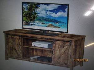 lot 48 image: Convenience Concepts Blake Barn Door TV Stand