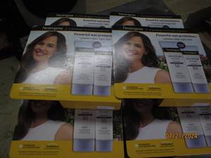 lot 217 image: 6 packages of 2 neutrogena ultra sheer dry-touch spf 55 sunscreen