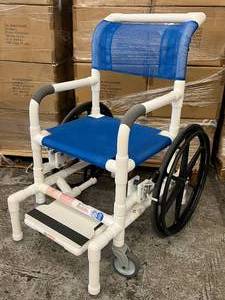 lot 19 image: MSRP $1600 Medline MJM Intl Self Propelled Bath Shower Commode Wheelchair With Retractable Footrest - 300 lbs. Max Weight Capacity - In Excellent Condition