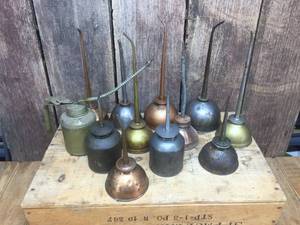 lot 130 image: 12 Vintage Oiler Cans
