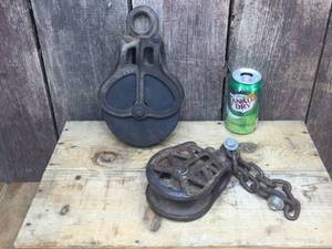 lot 131 image: 2 Vintage Barn Pulleys - 762A - H254