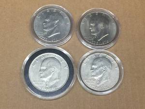 lot 159 image: 4 IKE Silver Dollars