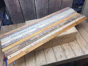 lot 186 image: Group Wooden Advertiser Yard Sticks