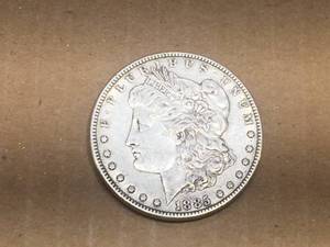 lot 217 image: 1885 U.S. Morgan Silver Dollar - AU 50
