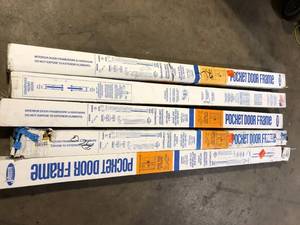 lot 7 image: Lot of Johnson Hardware 1500 Series 24 in. to 36 in. x 80 in. Universal Pocket Door Frame for 2x4 Stud Wall   Customer Returns See Pictures