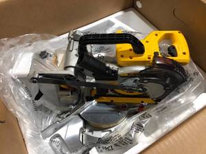 lot 10 image: DEWALT 20V MAX Cordless 7-14 in. Sliding Miter Saw with (1) 20V Battery 4.0Ah Customer Returns See Pictures