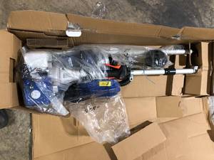 lot 25 image: WILD BADGER POWER 26 cc 2-Stroke 2-in-1 Gas Full Crank Straight Shaft Grass Trimmer with Brush Cutter Blade and Bonus Harness     Customer Returns See Pictures