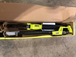 lot 32 image: RYOBI ONE 18V 18 in. Cordless Battery Pole Hedge Trimmer with 2.0 Ah Battery and Charger  Customer Returns See Pictures