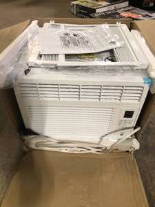 lot 36 image: GE 6,000 BTU 115V Window Air Conditioner Cools 250 Sq. Ft. with Remote Control in White Customer Returns See Pictures