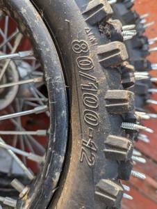 lot 44A image: Pair of Dirt Bike Studded Tires
