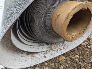 lot 48A image: Massive Roll Vinyl Flooring - See Images - Tons of Sq Ft