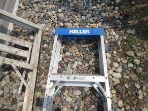 lot 42 image: Lot of Two Aluminum Extension Ladders - Keller Brand