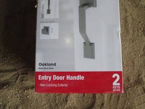 lot 77 image: TRU-BOLT Oakland Matte Black Entry Door Handle - 2 Keys Included