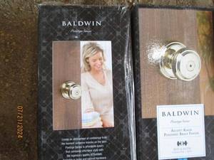 lot 81 image: Baldwin Prestige Series Alcott Knob Polished Brass Finish - Lot of 4