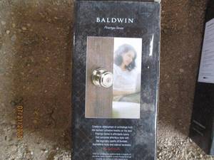 lot 83 image: Baldwin Prestige Series Keyed Entry Knobs - Lot of 2