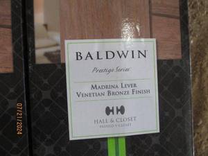 lot 85 image: Baldwin Prestige Series Madrona Lever - Venetian Bronze Finish (Set of 3)