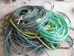 lot 99 image: Lot of Assorted Garden Hoses All need repair