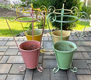 lot 101 image: Four Colorful Metal Planter Stands