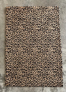 lot 140 image: Leopard Print Rug