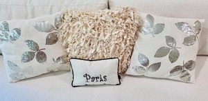 lot 93 image: Four Dazzling Throw Pillows with Cream, White, Silver Glitter and Floral