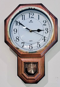 lot 66 image: Vintage Wall Clock by Quarts Regulator Justime