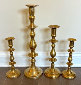 lot 169 image: Four Fine Brass Candle Holders