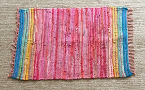 lot 214 image: Colorful Woven Rug by Dei