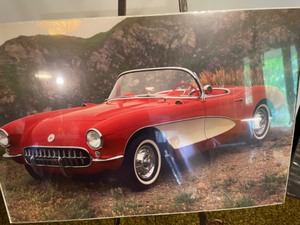 lot 108 image: Poster of a Chevy Corvette