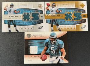 lot 57B image: Donovan McNabb 3 Card Relic Lot - 2005 Ultimate Collection 99, 2007 Ultimate Collection Gold 99, 2007 Ultimate Collection Silver 275 Football Cards