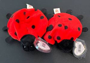 lot 64D image: (2) Minnesota Twins SGA Lucky the Ladybug Ty Beanie Babies with Cards from 1998