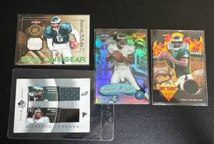 lot 76F image: Donovan McNabb 4 Card Lot Relic and Numbered - 345 with Michal Vick, 2998, 500 Football Cards