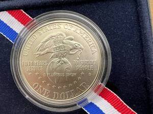 lot 17 image: 1991 USO Silver Dollar