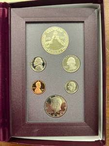 lot 20 image: 1988 US Mint Prestige Set including the 1988 Olympic Silver Dollar