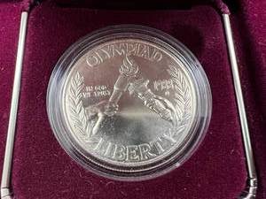 lot 22 image: 1988 US Mint Olympic Silver Dollar