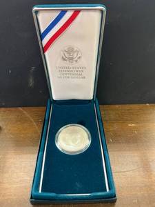 lot 23 image: 1990 US Mint Eisenhower Centennial Silver Dollar