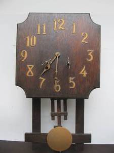 lot 57 image: Very Nice Antique Mission Oak Wall Clock